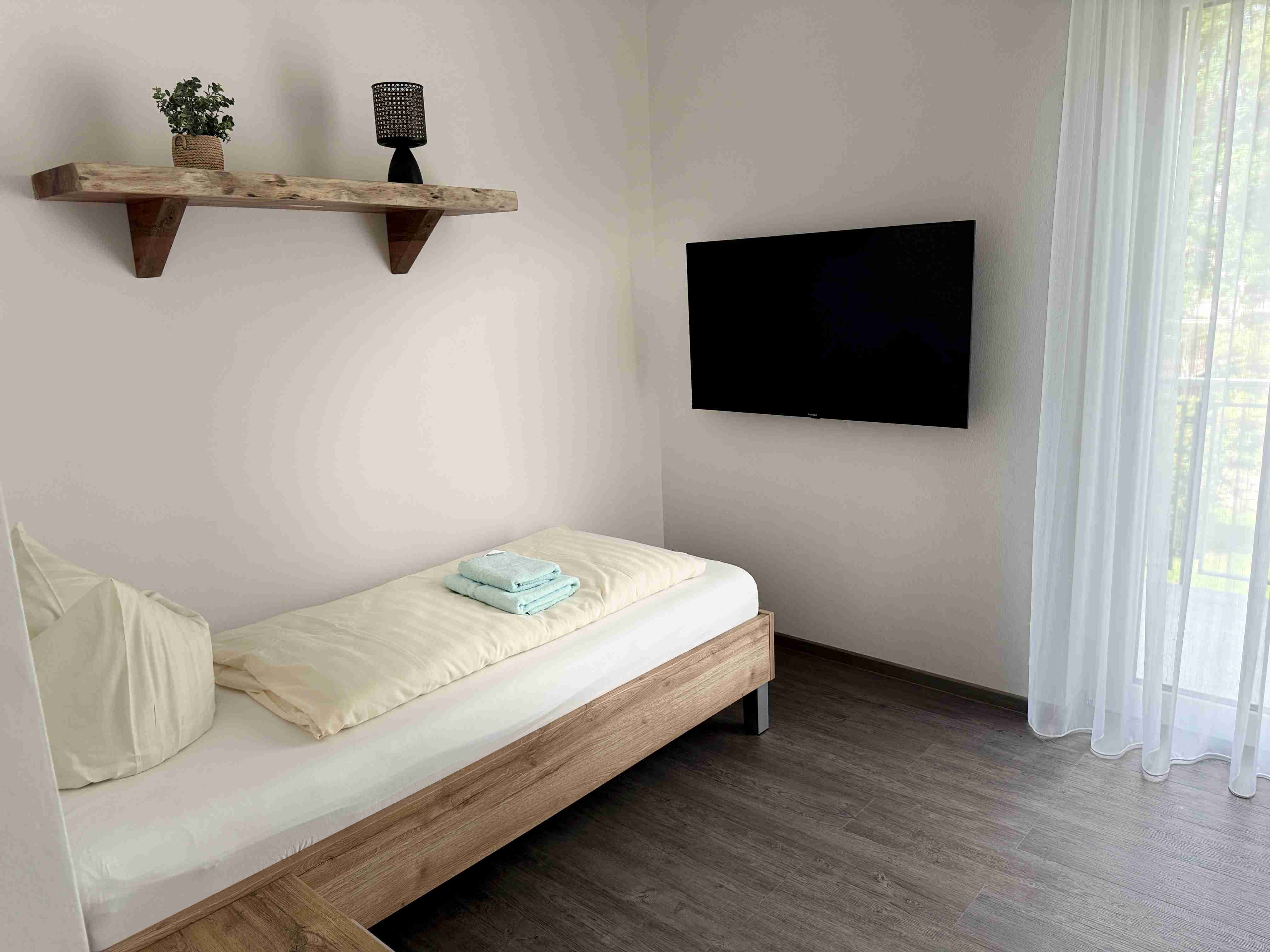 images/ferienhaus_lilienstein/wilde_hoelle/schlafzimmer3_01.JPG#joomlaImage://local-images/ferienhaus_lilienstein/wilde_hoelle/schlafzimmer3_01.JPG?width=4032&height=3024